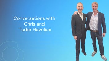 Conversation with Chris and Tudor Havriliuc featuring an image of Chris and Tudor smiling together